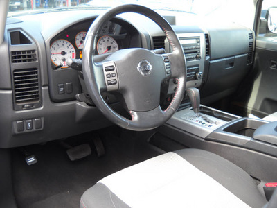 nissan titan 2010 black gasoline 8 cylinders 4 wheel drive automatic 79925