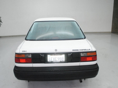 toyota corolla 1989 white sedan deluxe gasoline 4 cylinders front wheel drive automatic 91731