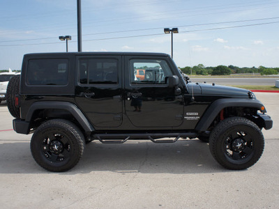 jeep wrangler unlimited 2012 black suv sport gasoline 6 cylinders 4 wheel drive automatic 76087