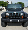 jeep wrangler unlimited 2012 black suv sport gasoline 6 cylinders 4 wheel drive automatic 76087