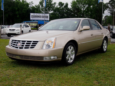 cadillac dts 2006 gold sedan luxury i gasoline 8 cylinders front wheel drive automatic 27569