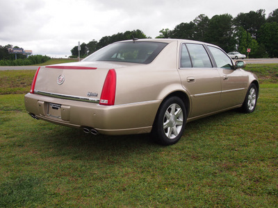 cadillac dts 2006 gold sedan luxury i gasoline 8 cylinders front wheel drive automatic 27569