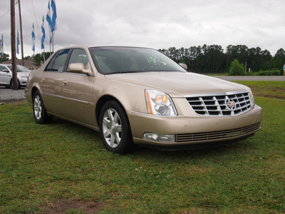 cadillac dts 2006 gold sedan luxury i gasoline 8 cylinders front wheel drive automatic 27569