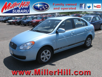 hyundai accent 2009 lt  blue sedan gls gasoline 4 cylinders front wheel drive automatic with overdrive 55811