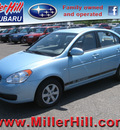 hyundai accent 2009 lt  blue sedan gls gasoline 4 cylinders front wheel drive automatic with overdrive 55811