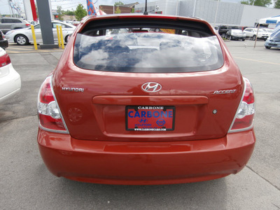 hyundai accent 2007 orange hatchback gs gasoline 4 cylinders front wheel drive automatic with overdrive 13502