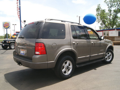 ford explorer 2002 harvest gold suv xlt gasoline 6 cylinders 4 wheel drive automatic 80911