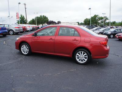 toyota corolla 2010 red sedan gasoline 4 cylinders front wheel drive automatic 19153