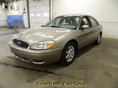 ford taurus 2006 tan sedan sel gasoline 6 cylinders front wheel drive automatic 14304