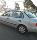 chevrolet prizm 2002 silver sedan gasoline 4 cylinders front wheel drive automatic 92882