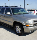 chevrolet tahoe 2002 pewter suv z71 flex fuel 8 cylinders 4 wheel drive automatic 76087