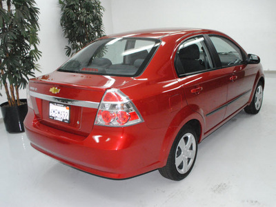 chevrolet aveo 2010 red sedan lt gasoline 4 cylinders front wheel drive automatic 91731