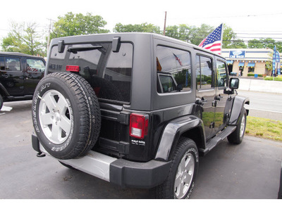 jeep wrangler unlimited 2012 black suv sahara gasoline 6 cylinders 4 wheel drive automatic 07730