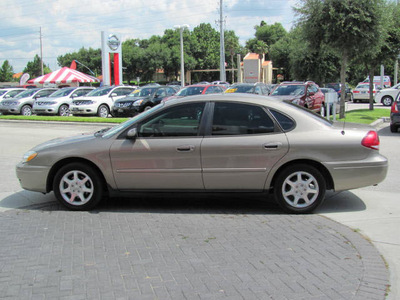 ford taurus 2006 gold sedan sel gasoline 6 cylinders front wheel drive automatic 33884