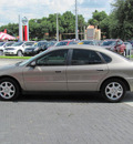 ford taurus 2006 gold sedan sel gasoline 6 cylinders front wheel drive automatic 33884