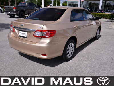 toyota corolla 2011 gold sedan le gasoline 4 cylinders front wheel drive automatic 32771