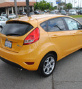 ford fiesta 2011 orange hatchback ses gasoline 4 cylinders front wheel drive automatic 91010