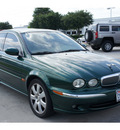 jaguar x type 2004 green sedan 3 0 gasoline 6 cylinders all whee drive 5 speed automatic 77090