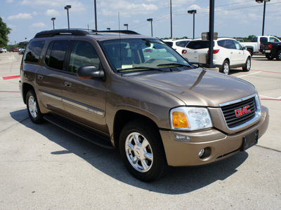 gmc envoy xl 2003 brown suv slt gasoline 6 cylinders 4 wheel drive automatic 76087