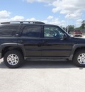 chevrolet tahoe 2010 black suv gasoline 8 cylinders 4 wheel drive automatic 77388