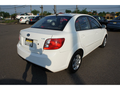 kia rio 2010 white sedan gasoline 4 cylinders front wheel drive automatic with overdrive 08902