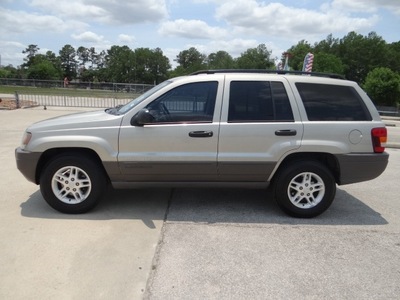 jeep grand cherokee 2004 tan suv special edition gasoline 6 cylinders rear wheel drive automatic 77388