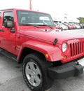 jeep wrangler unlimited 2012 red suv sahara gasoline 6 cylinders 4 wheel drive automatic 34731