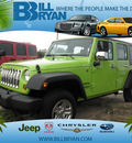 jeep wrangler unlimited 2012 green suv sport gasoline 6 cylinders 4 wheel drive automatic 34731
