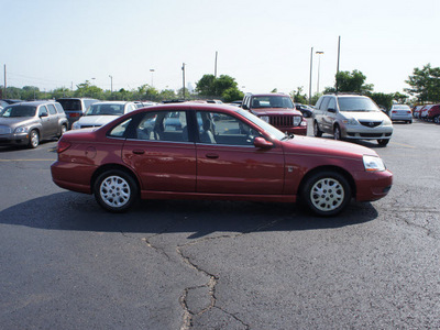 saturn l series 2003 red sedan l200 gasoline 4 cylinders dohc front wheel drive automatic 19153