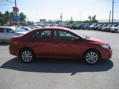 toyota corolla 2010 red sedan le gasoline 4 cylinders front wheel drive automatic 62863