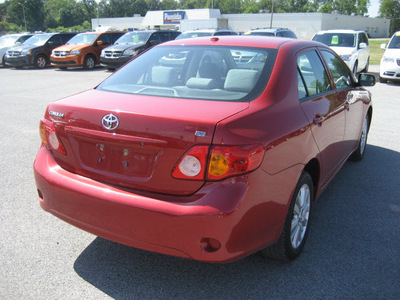 toyota corolla 2010 red sedan le gasoline 4 cylinders front wheel drive automatic 62863