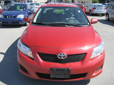 toyota corolla 2010 red sedan le gasoline 4 cylinders front wheel drive automatic 62863