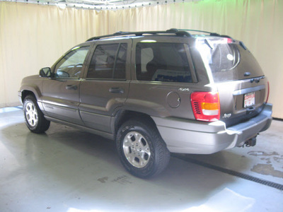 jeep grand cherokee 2000 beige suv laredo gasoline 6 cylinders 4 wheel drive automatic with overdrive 44883