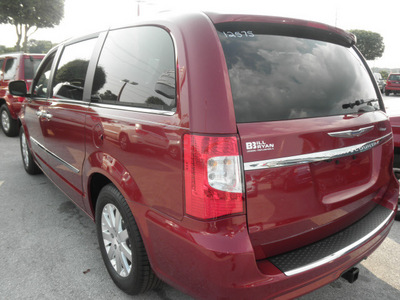 chrysler town and country 2012 red van touring l flex fuel 6 cylinders front wheel drive automatic 34731