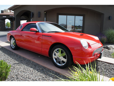 ford thunderbird 2002 red deluxe gasoline 8 cylinders rear wheel drive automatic 99352