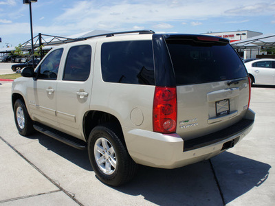 gmc yukon 2011 gold suv flex fuel 8 cylinders 2 wheel drive automatic 76087