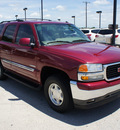 gmc yukon 2005 red suv gasoline 8 cylinders rear wheel drive automatic 76087