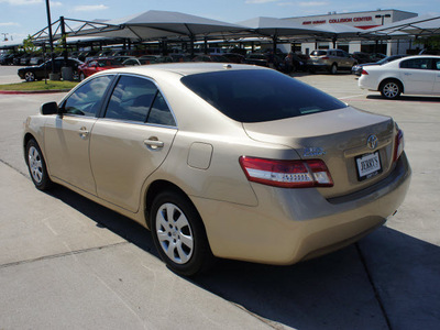 toyota camry 2010 gold sedan le gasoline 4 cylinders front wheel drive automatic 76087