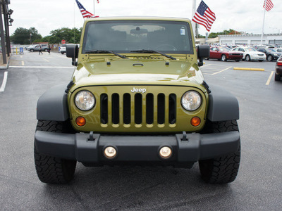 jeep wrangler 2010 green suv sport gasoline 6 cylinders 4 wheel drive automatic 33021