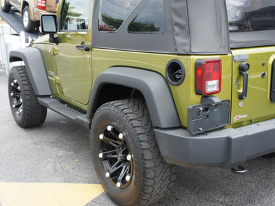 jeep wrangler 2010 green suv sport gasoline 6 cylinders 4 wheel drive automatic 33021