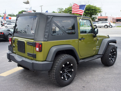 jeep wrangler 2010 green suv sport gasoline 6 cylinders 4 wheel drive automatic 33021