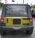 jeep wrangler 2010 green suv sport gasoline 6 cylinders 4 wheel drive automatic 33021