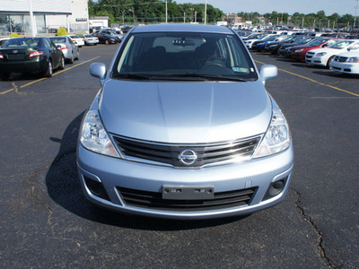 nissan versa 2010 lt blue hatchback gasoline 4 cylinders front wheel drive automatic 19153