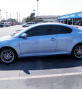 scion tc 2009 lt  blue coupe gasoline 4 cylinders front wheel drive 5 speed manual 32401
