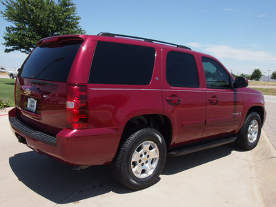 chevrolet tahoe 2007 red suv lt gasoline 8 cylinders rear wheel drive automatic 76018