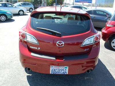 mazda mazda3 2010 red hatchback s grand touring gasoline 4 cylinders front wheel drive automatic 94010
