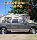 ford f 150 2006 dk  gray xlt gasoline 8 cylinders rear wheel drive automatic with overdrive 77379