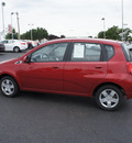 chevrolet aveo 2011 red hatchback aveo5 lt gasoline 4 cylinders front wheel drive automatic 19153
