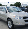 chevrolet traverse 2010 gold suv lt gasoline 6 cylinders front wheel drive 6 speed automatic 77090