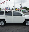 jeep patriot 2010 white suv gasoline 4 cylinders front wheel drive automatic 33021